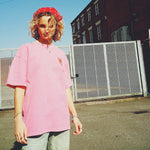 female model wearing pink t shirt washed streetwear by occupo gloria